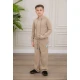 طقم ولادي أنيق قطعتين لون بيج مع قبعة هودي بجيوب أمامية وأكمام طويلة و بنطلون بجيوب جانبية