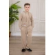 طقم ولادي أنيق قطعتين لون بيج مع قبعة هودي بجيوب أمامية وأكمام طويلة و بنطلون بجيوب جانبية