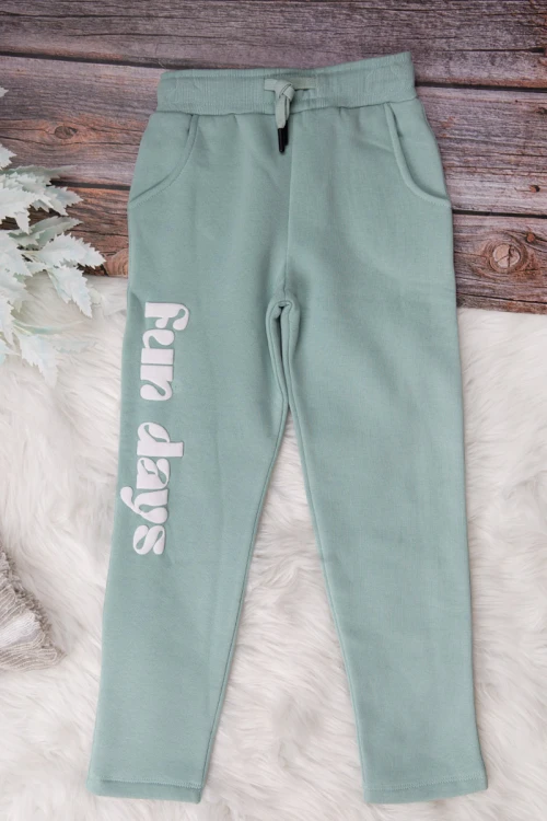 طقم شتوي بناتي أنيق قطعتين لون تركواز   بكتابات من الأمام