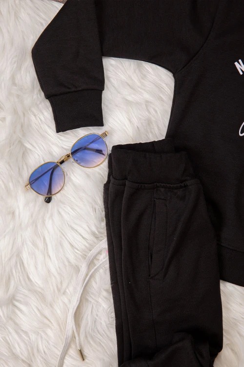 Elegant two-piece girls' winter set, black, with writing and drawings on the front