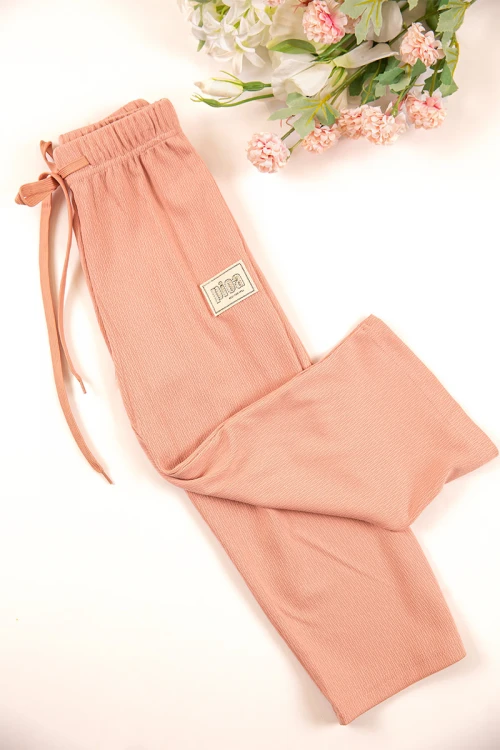 طقم بناتي شتوي قطعتين لون خربزي بأكمام طويلة وقبعة متصلة مع بنطلون طويل بزم و رباط على الخصر