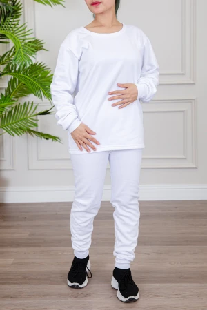 بيجاما نسائية شتوية قطعتين لون أبيض سادة بياقة دائرية و بأكمام و بنطلون طويل