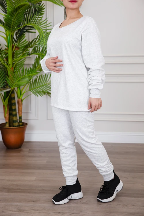 بيجاما نسائية شتوية قطعتين لون اوف وايت بياقة دائرية و بأكمام و بنطلون طويل