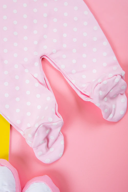 بربتوز بناتي أطفال لون وردي منقط بالأبيض برسومات من الأمام ذو أكمام طويلة و أزرار من الأمام