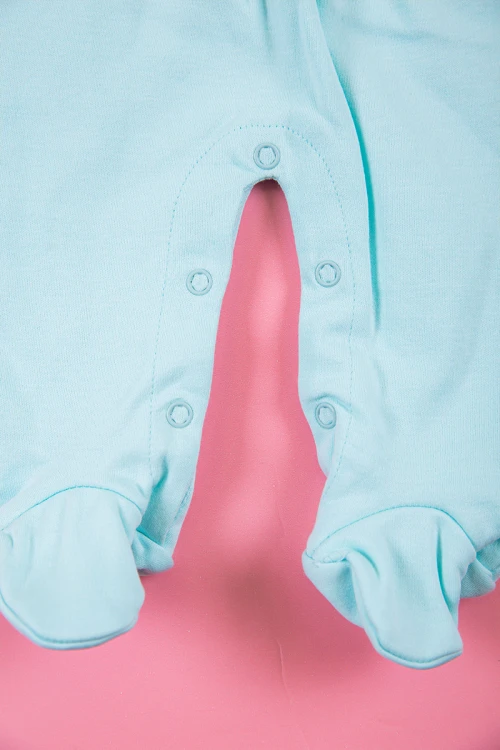 بربتوز بناتي أطفال لون سماوي مزين بزخرفة من الأمام ذو أكمام طويلة و أزرار من الخلف و الأسفل