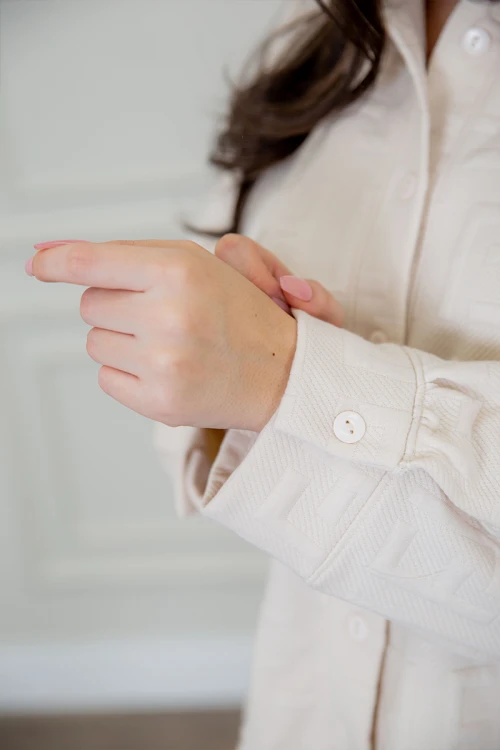 طقم نسائي شتوية قطعتين لون كحلي مزينة بالنجوم ذو أكمام طويلة و بنطلون بزم و رباط من الخصر