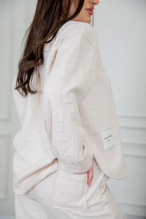 طقم نسائي شتوية قطعتين لون كحلي مزينة بالنجوم ذو أكمام طويلة و بنطلون بزم و رباط من الخصر