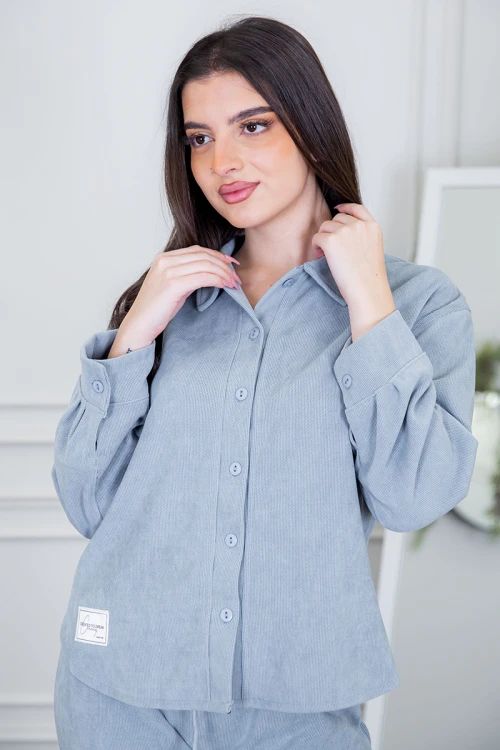 طقم نسائي شتوية قطعتين لون كحلي مزينة بالنجوم ذو أكمام طويلة و بنطلون بزم و رباط من الخصر