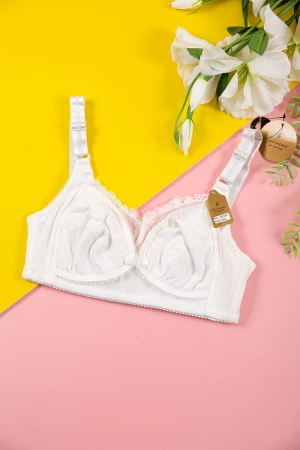 صدرية نسائي لون أبيض مزينة بأزرار و قماش دانتيل من الأمام بأحزمة قابلة للتعديل من الخلف