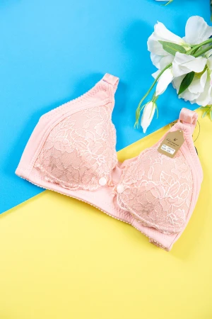 صدرية نسائي مبطنة لون خربزي مزينة بدانتيل و أزرار من الأمام و بأحزمة قابلة للتعديل من الخلف  