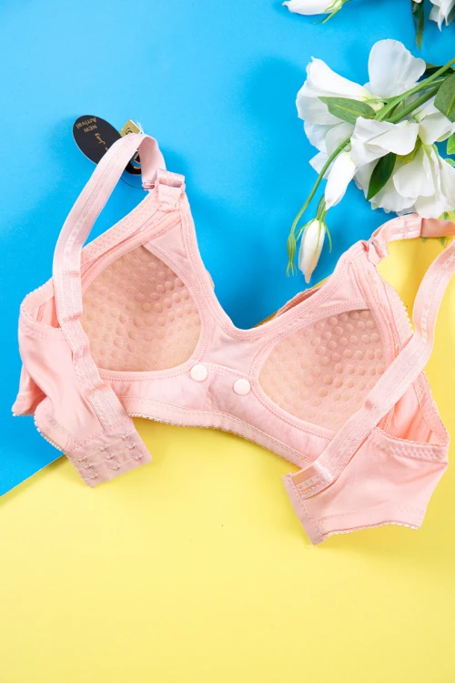 صدرية نسائي مبطنة لون خربزي مزينة بدانتيل و أزرار من الأمام و بأحزمة قابلة للتعديل من الخلف