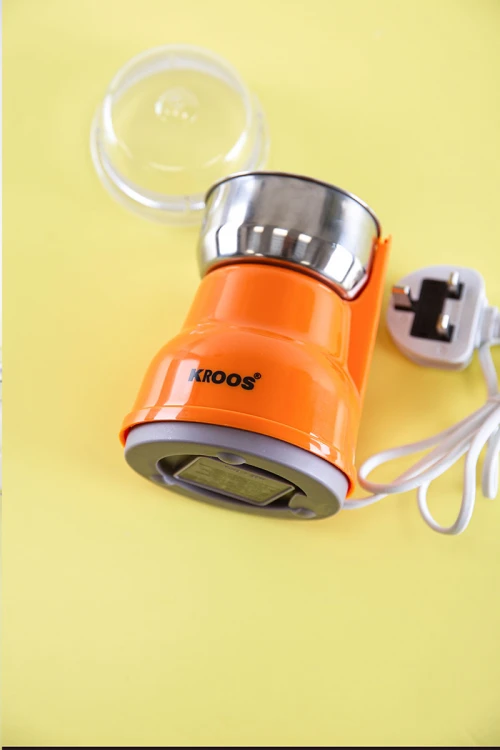 مطحنة قهوة لون برتقالي بوعاء و شفرات من الفولاذ المقاوم للصدأ