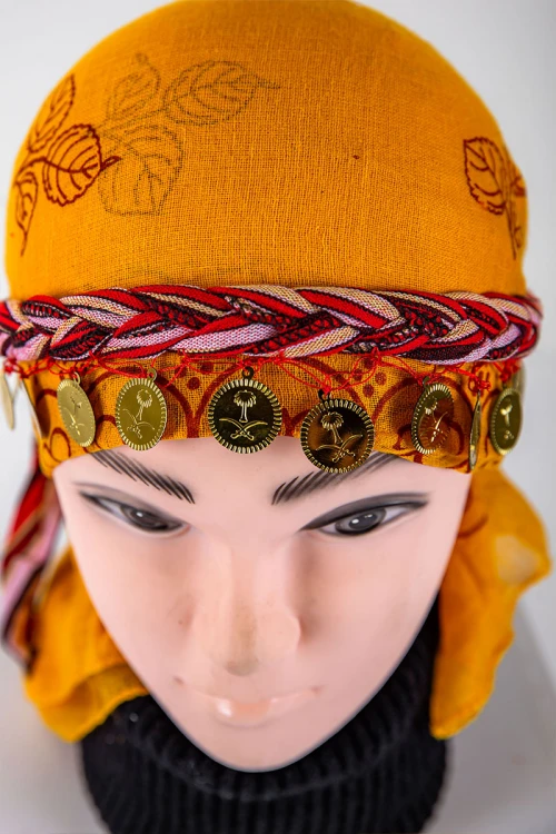 ربطة رأس تراثية ملونة على شكل ضفائر مزينة بجنيهات ذهبية