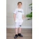 ترنج ولادي قطعتين لون أبيض تيشيرت بكتابات من الأمام و شورت بكتابات من الأمام و جيوب من الجانبين