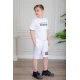 ترنج ولادي قطعتين لون أبيض تيشيرت بكتابات من الأمام و شورت بكتابات من الأمام و جيوب من الجانبين