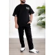 طقم رجالي قطعتين لون أسود تيشيرت بكتابات و طبعات مع بنطلون طويل بجيوب من الجانبين