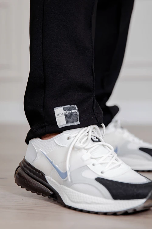 طقم رجالي قطعتين لون أسود تيشيرت بكتابات و طبعات مع بنطلون طويل بجيوب من الجانبين