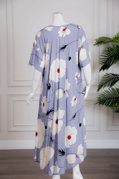 قميص نسائي متعدد الألوان مزين بطبعات من الورود بياقة سبعة و أكمام قصيرة