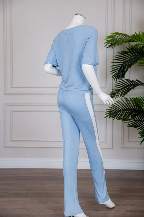 بيجاما نسائية قطعتين متعددة الألوان تيشيرت بياقة دائرية مزين بطبعات مع بنطلون طويل برباط في الخصر