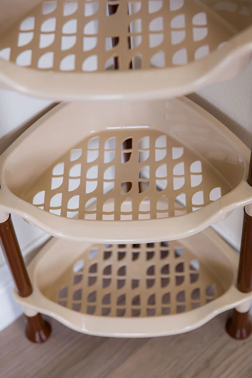 سلة بلاستيك مدورة لون بيج متعددة الاستخدامات 4 رفوف مخرمة