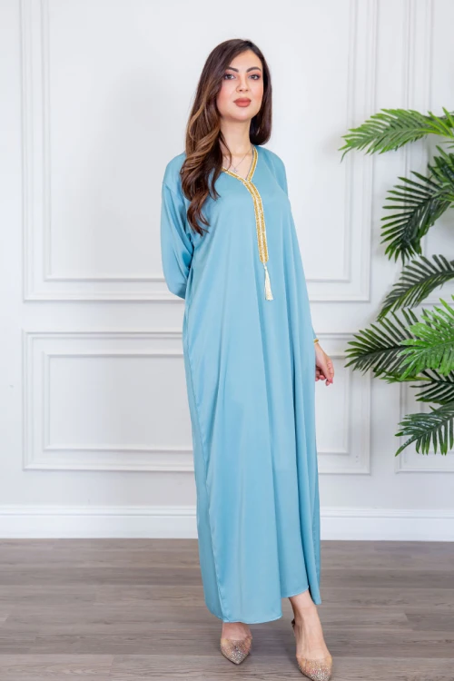 جلابية نسائية لون سماوي ياقة بقصة سبعة بتطريز ذهبي ذو أكمام طويلة