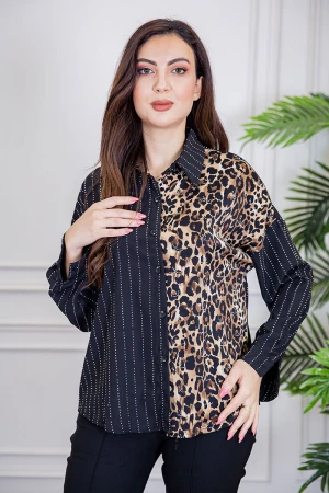 بلوزة نسائية لون أسود ياقة مطوية مزين بفصوص و بقماش التايقر بأزرار من الأمام و الأكمام 