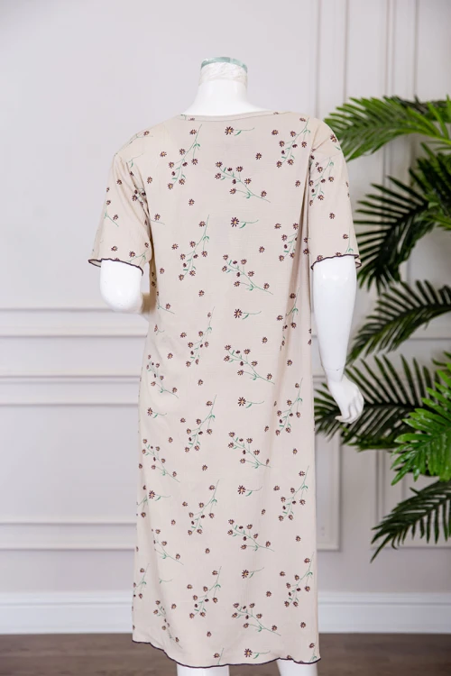 قميص نسائي ميدي لون بيج مشجر ياقة دائرية مزينة بفيونكة و بأكمام قصيرة