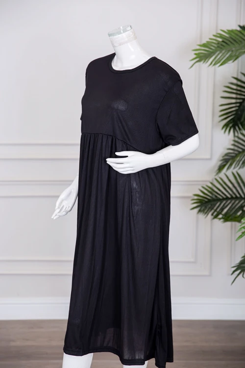 قميص نسائي قصير لون أسود قصة كلوش ياقة دائرية و بأكمام قصيرة