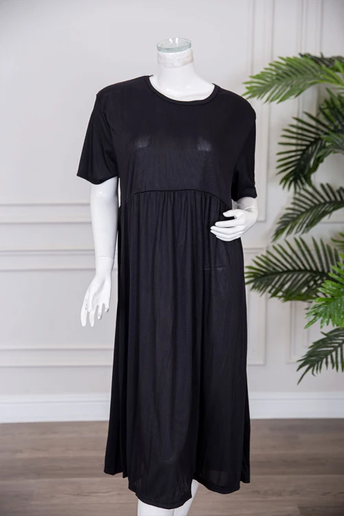 قميص نسائي قصير لون أسود قصة كلوش ياقة دائرية و بأكمام قصيرة