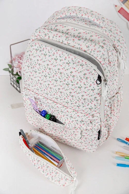 شنطة ظهر مدرسية بناتي مشجرة بجيوب متعددة مع مقلمة