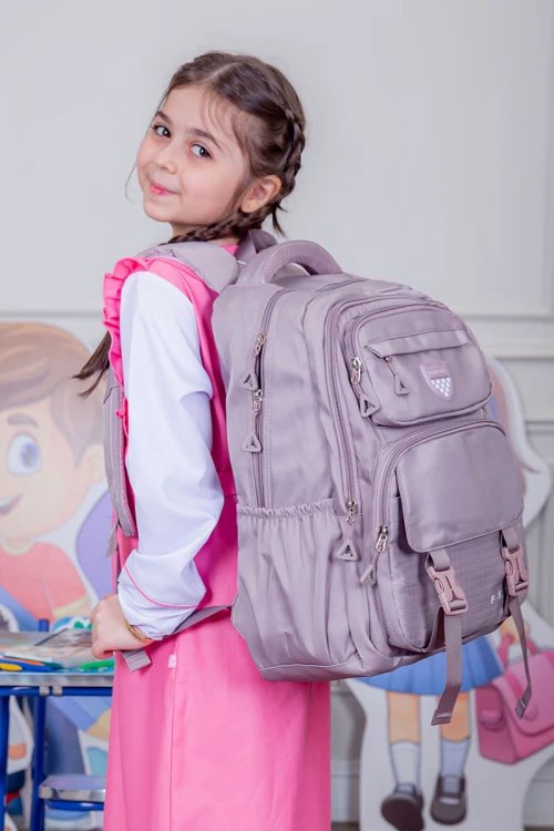 شنطة ظهر مدرسية متعددة الألوان بجيوب متعددة مع مقلمة