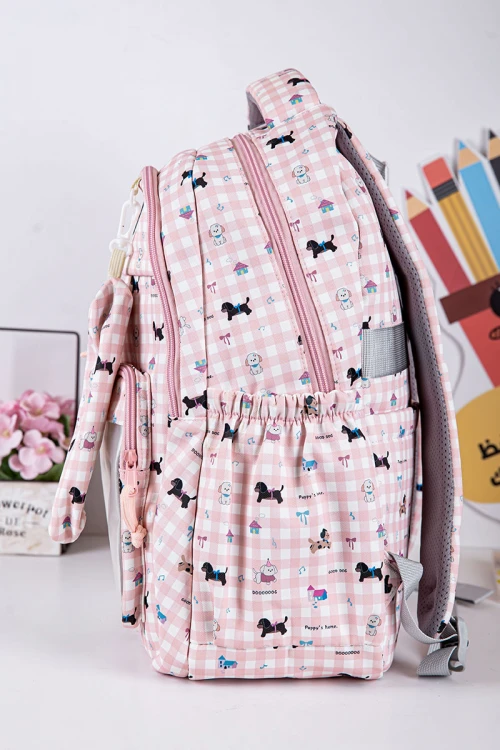 شنطة ظهر مدرسية بناتي متعدد الألوان مزينة برسومات ملونة و بجيوب متعددة مع مقلمة