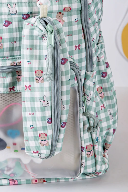 شنطة ظهر مدرسية بناتي متعدد الألوان مزينة برسومات ملونة و بجيوب متعددة مع مقلمة