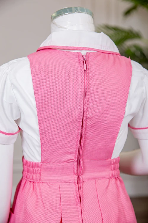 مريول مدرسي بناتي قطعتين لون وردي ياقة قصة سبعة بخصر مزموم