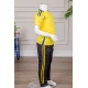 طقم ولادي رياضي قطعتين تيشيرت لون أصفر مقلم باللون الأزرق و بنطلون طويل لون أسود مخطط باللون الأصفر من الجانبين بجيوب و بزم من الأسفل