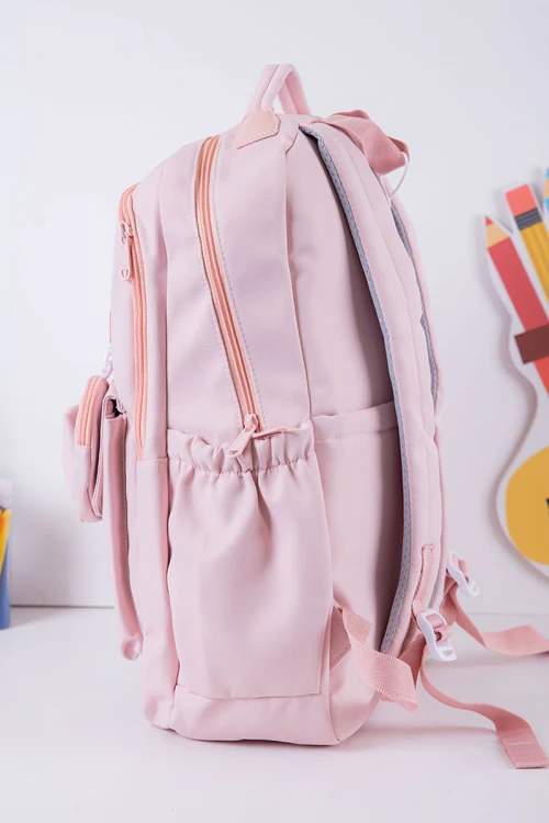شنطة ظهر مدرسية بناتي لون وردي بجيوب متعددة مع محفظة دائرية