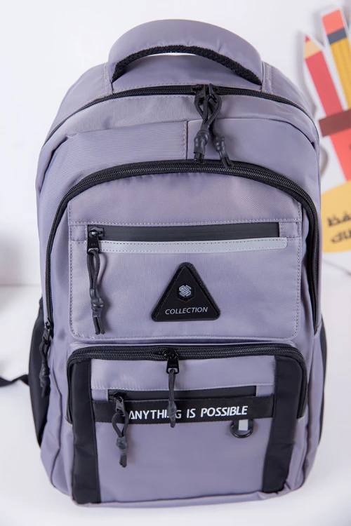 شنطة ظهر مدرسية ولادي لون رصاصي بجيوب متعددة