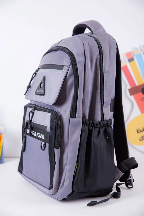 شنطة ظهر مدرسية ولادي لون رصاصي بجيوب متعددة