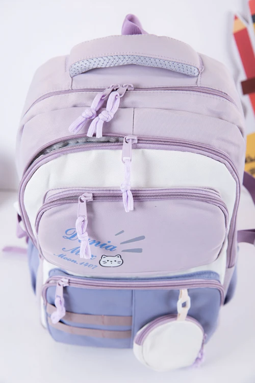 شنطة ظهر مدرسية متعددة الألوان بجيوب متعددة مع محفظة دائرية