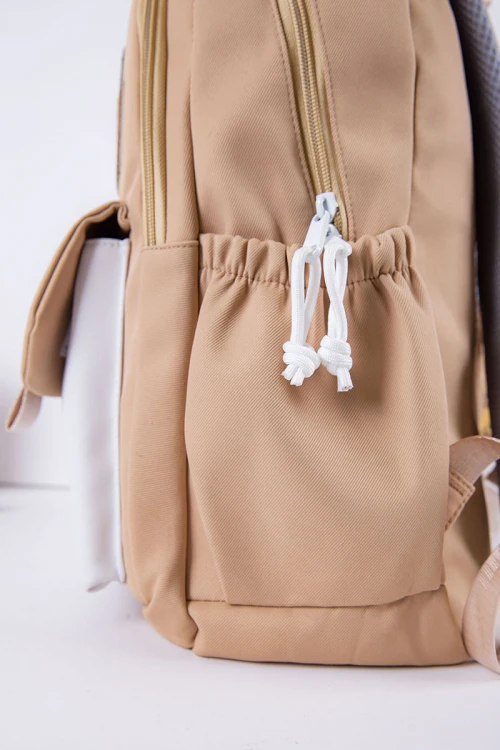 شنطة ظهر مدرسية متعددة الألوان بجيوب متعددة