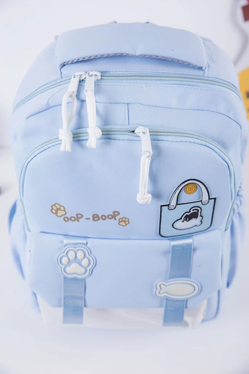 شنطة ظهر مدرسية متعددة الألوان بجيوب متعددة