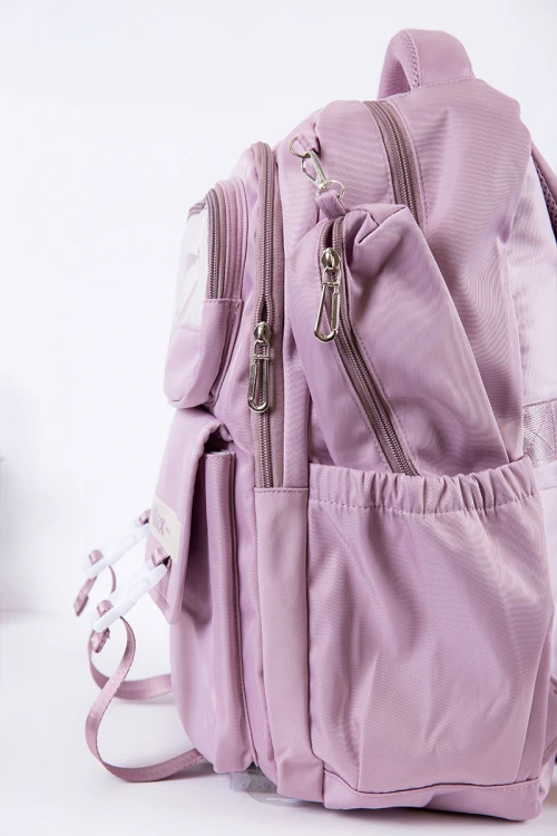 شنطة ظهر مدرسية متعددة الألوان بجيوب متعددة مع مقلمة