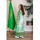 بشت بناتي عسيري تل لليوم الوطني لون أخضر مزين بتطريز تراثي سيفين و نخلة ياقة قصة سبعة و أكمام طويلة