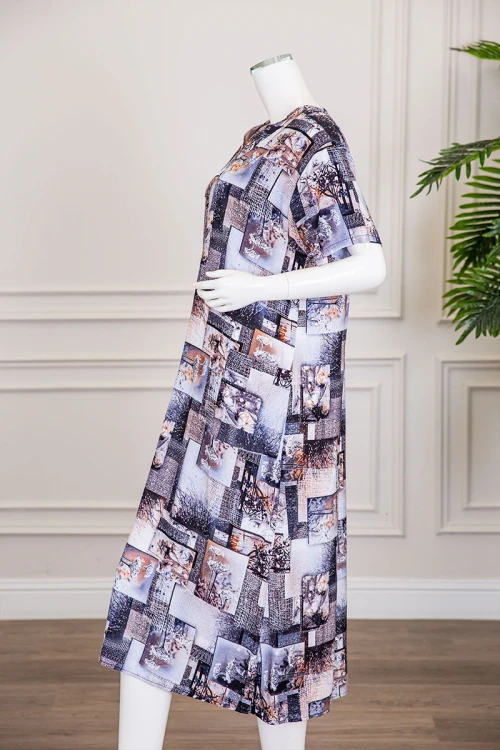 قميص نسائي ميدي مزين برسومات و أشكال ملونة بفصوص ياقة قصة سبعة و أكمام قصيرة