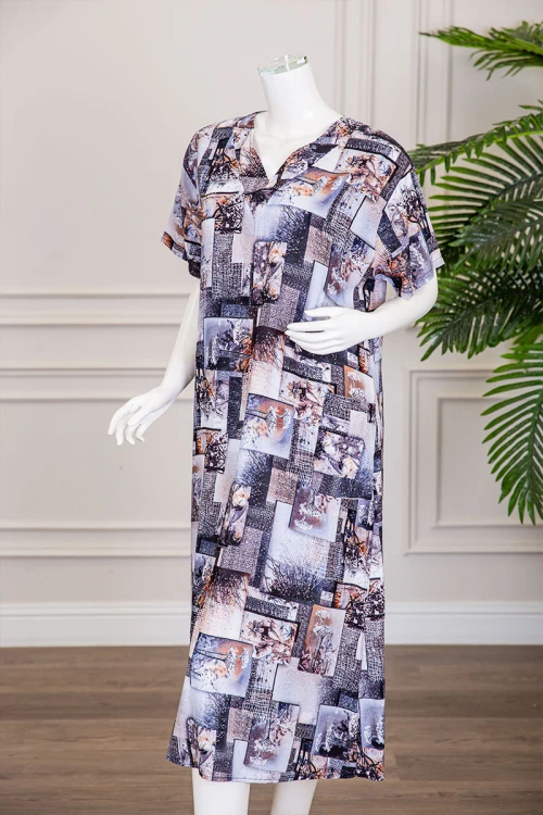 قميص نسائي ميدي مزين برسومات و أشكال ملونة بفصوص ياقة قصة سبعة و أكمام قصيرة