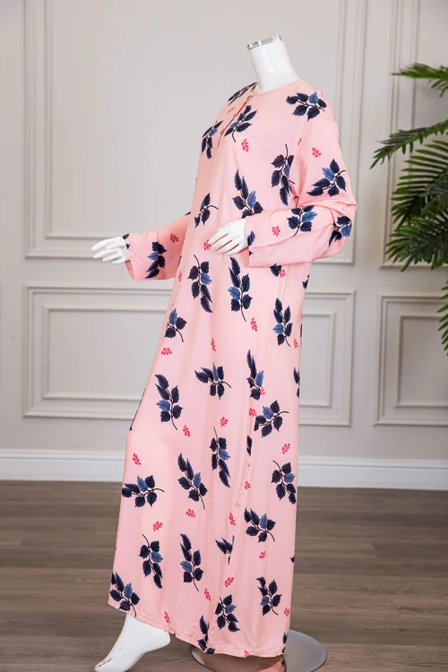 قميص نسائي طويل لون خربزي مشجر ياقة دائرية بأزرار من الأمام و أكمام طويلة