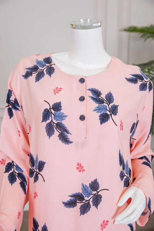 قميص نسائي طويل لون خربزي مشجر ياقة دائرية بأزرار من الأمام و أكمام طويلة