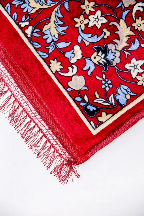 سجادة صلاة متعددة الألوان مزينة برسومات و زخارف من الأمام