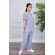 بيجامة عاملة قطعتين متعددة الألوان بلوزة بياقة مطوية بأزرار و جيوب من الأمام بأكمام قصيرة مع بنطلون طويل