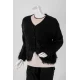بلوزة نسائية شتوية لون أسود مزينة بخيوط طويلة بأزرار أمامية كبيرة و بأكمام طويلة
